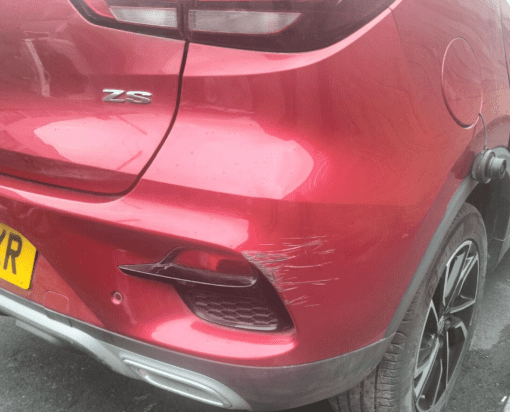 MG ZS 2019-2023 REAR BUMPER COVER PANEL WITH DIFFUSER REFLECTORS SENSORS IN RED - Image 2
