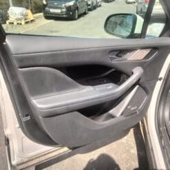 JAGUAR I PACE S 2018-2023 PASSENGER SIDE FRONT LEATHER DOOR CARD TRIM IN GREY
