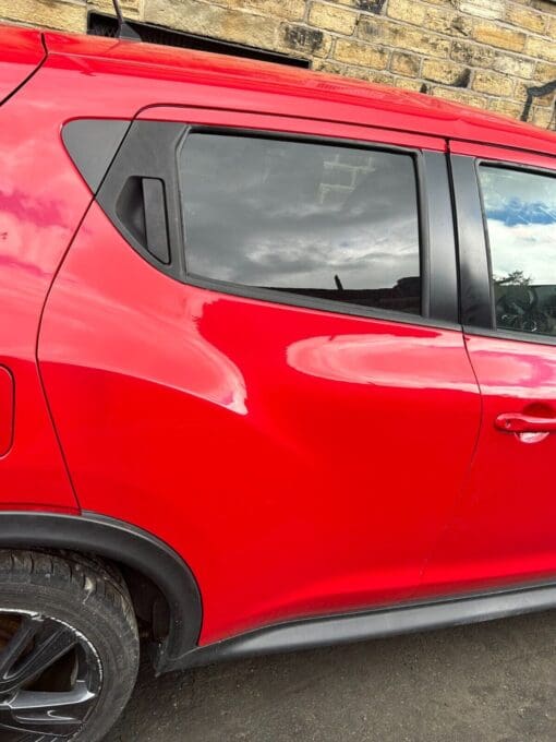 NISSAN JUKE F15 2010-2019 O/S/R DRIVERS SIDE REAR RIGHT SIDE DOOR SHELL IN RED