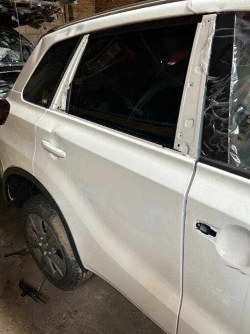 SUZUKI VITARA 2017-2022 O/S/R DRIVER SIDE REAR DOOR IN WHITE *SMALL DENT*
