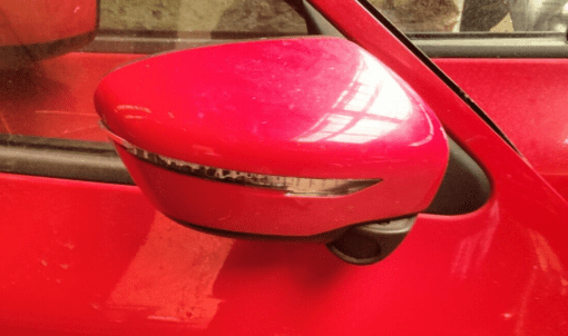 NISSAN JUKE F15 2014-2019 DRIVER SIDE RIGHT WING MIRROR POWER FOLD IN  RED