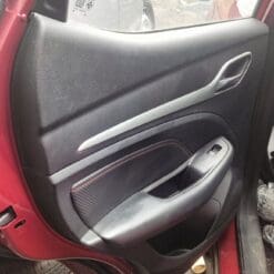 MG ZS 2017-2022 PASSENGER SIDE REAR LEATHER DOOR CARD TRIM IN RED STITCHING