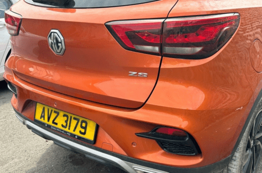 MG ZS 2021-2024 REAR BUMPER COVER PANEL WITH DIFFUSER REFLECTORS IN ORANGE - Image 3